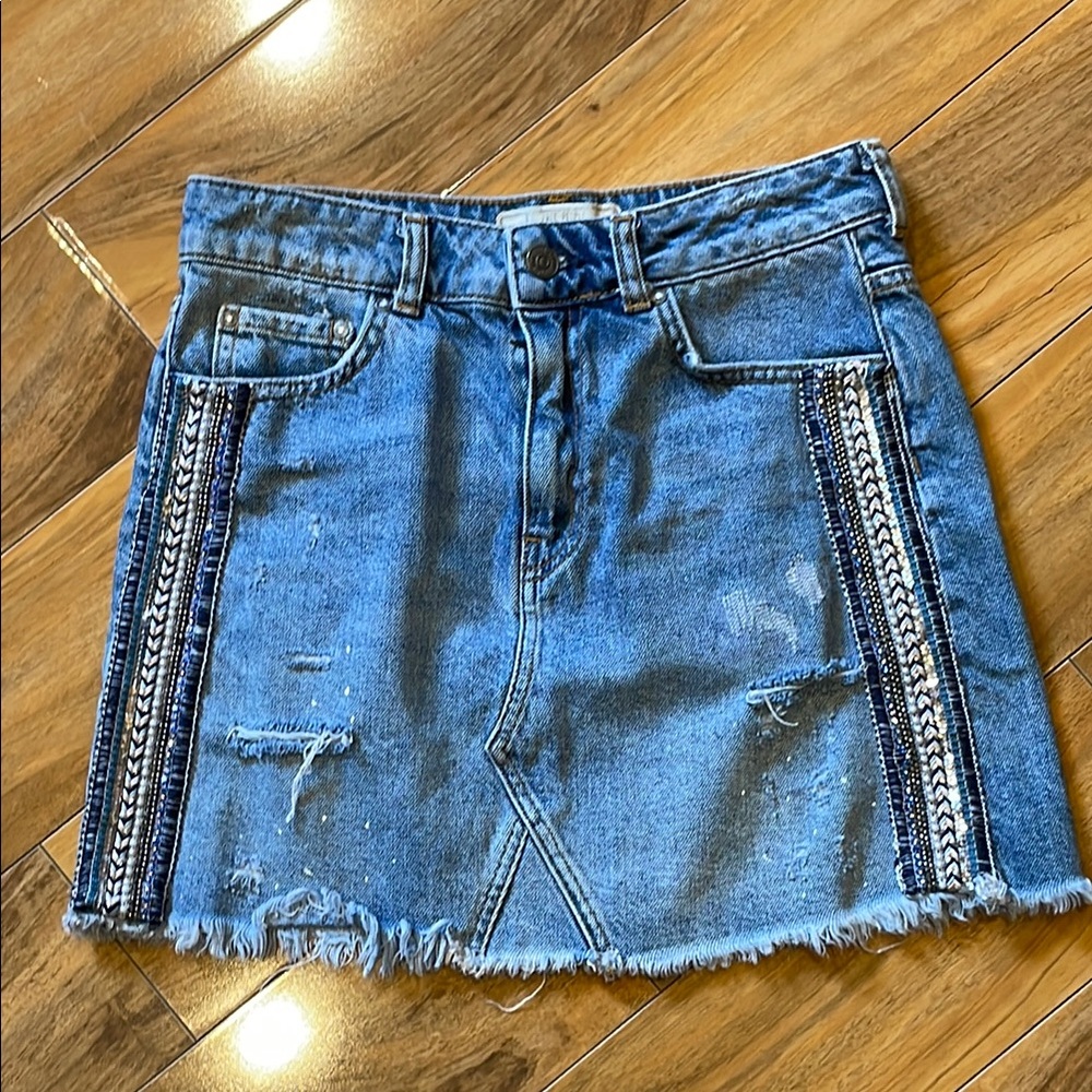 Size 2,  free people denim mini skirt with embellishments